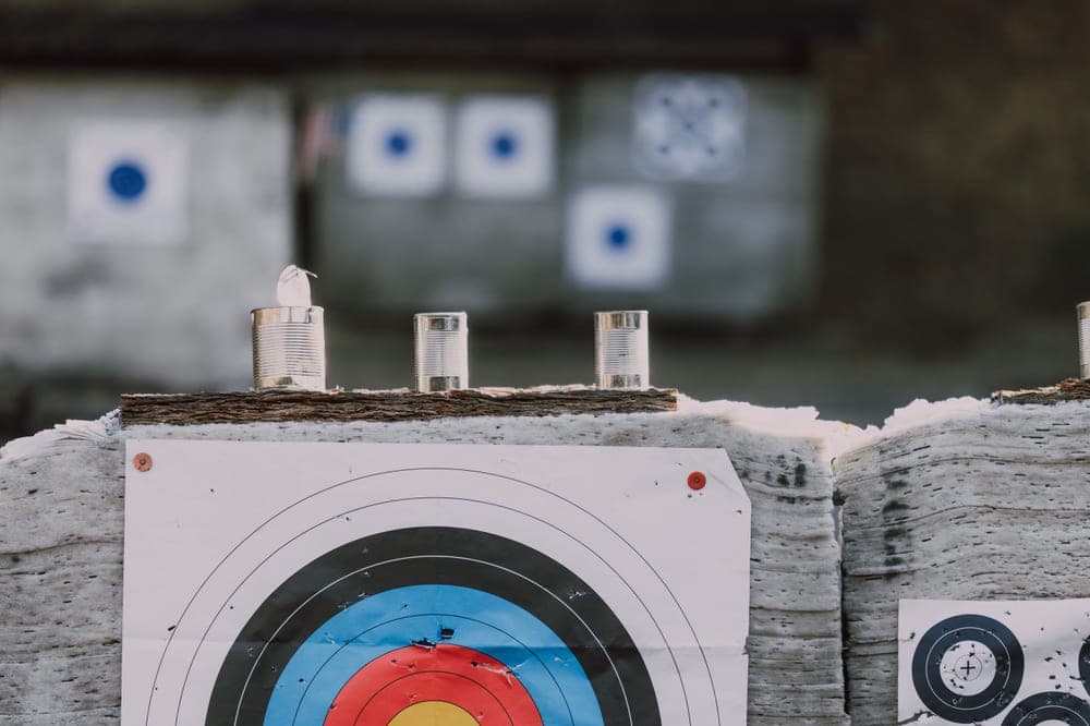 Targets and steel cans at an outdoor shooting range